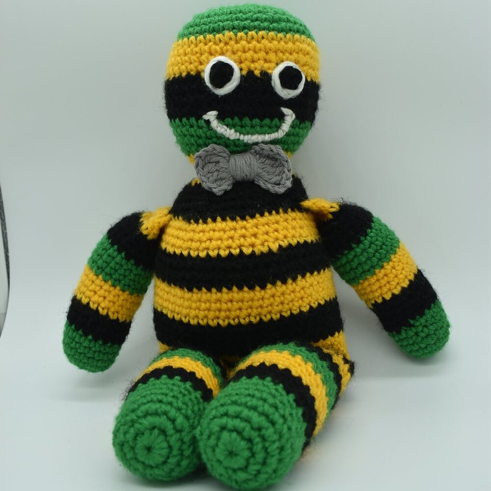 Hand crafted Crochet Striped Doll Push With a Gray Bow Tie and Embridered Face